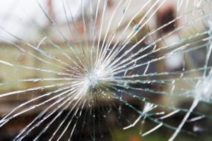 Property Crimes Lawyer in Tustin | Simmrin Law Group broken glass due to vandalism