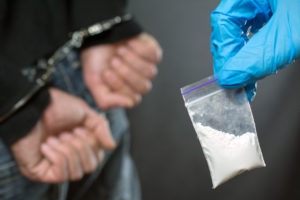 Carlsbad Drug Crimes Lawyers | Simmrin Law Group | Free Case Review man arrested for possession of illegal controlled substance