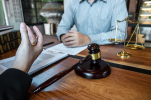 Conspiracy Lawyer in Los Angeles, CA | Call Us 24/7 a lawyer talking to a client