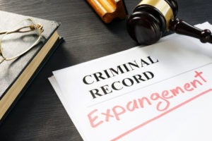 gavel atop paper with words criminal record expungement