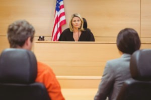 Failure to Register as Sex Offender Defense Lawyer in Los Angeles | Free Consultations 24/7 lawyer and client speaking to judge