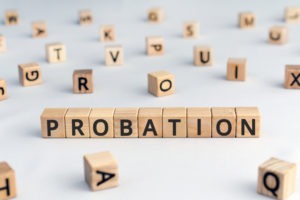 the word probation is spelled out with wooden blocks