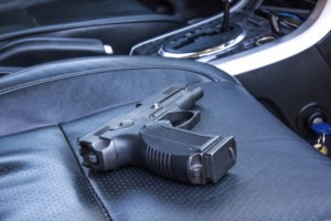 PC 25610: Conditions on Carrying a Firearm in Motor Vehicle a gun in the passenger seat of a car