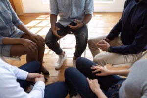 PC 1000: California’s Drug Diversion Program people sitting in a circle at a drug rehab program