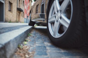 California Vehicle Code 21663: Driving on the Sidewalk Violation car with one wheel on sidewalk