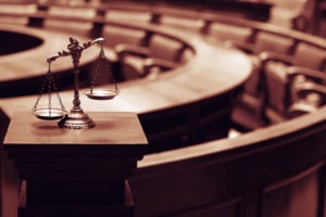 CA Penal Code Section 1368 | Mental Competency for Trial scales of justice in empty courtroom