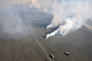 PC 22810: Unlawful Use of Tear Gas in California teargas bombs going off in the street