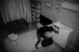 PC 460: First Degree Residential Burglary overhead view of burglar stealing from home