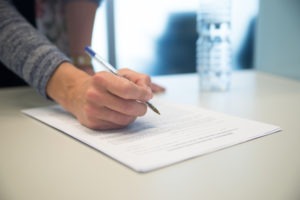 person signing a confidentiality agreement