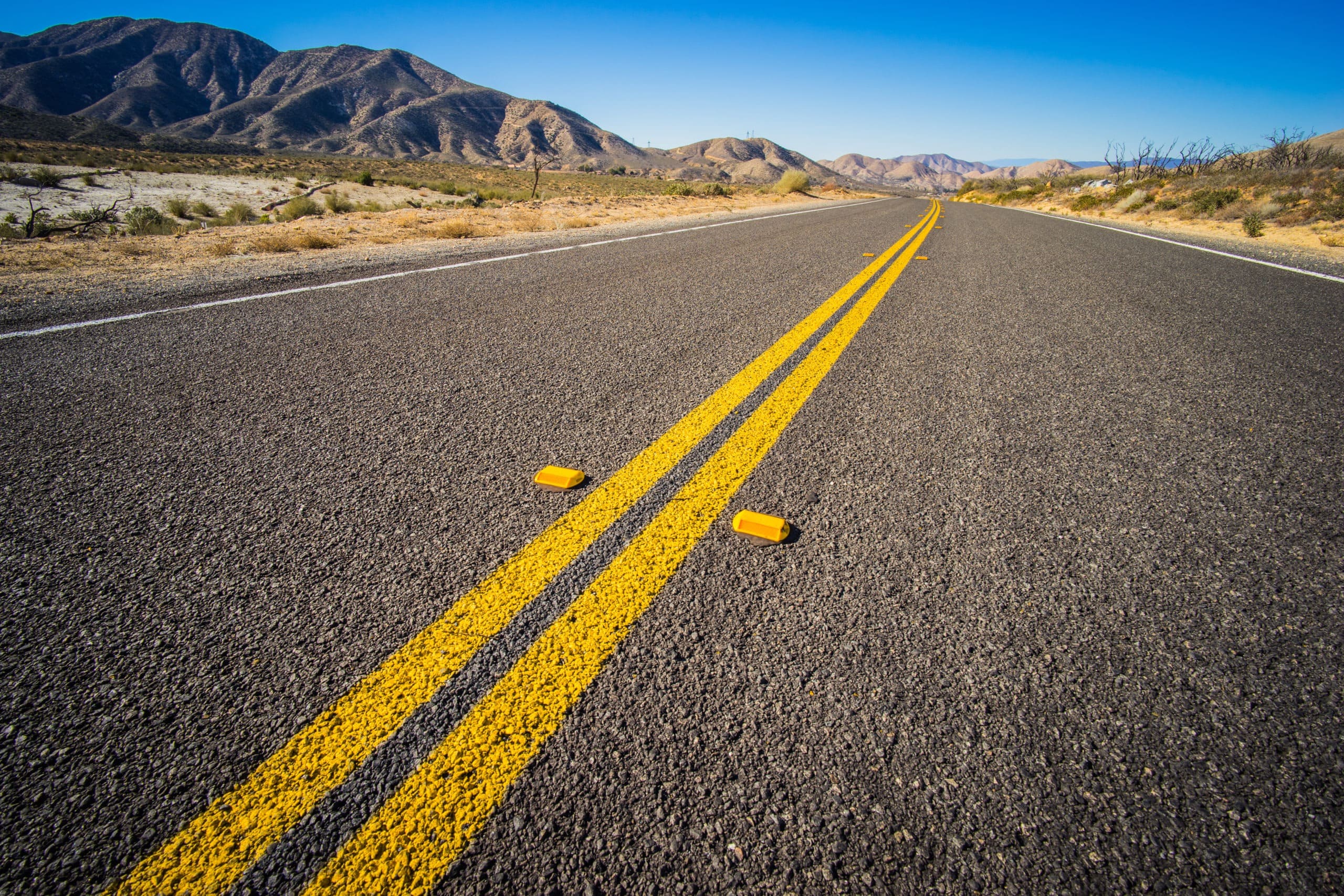 California VC 21460: Crossing Double Yellow Lines