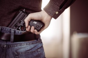 Weapons Charge Lawyer in Pasadena | Free Consultations 24/7 man brandishing a concealed weapon in public