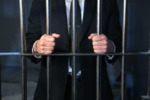 White Collar Crime Lawyers in Buena Park | 24/7 Help businessman behind bars