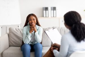Mental Health Lawyer in Tustin | Free Consultations 24/7 black woman talking to therapist