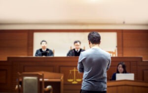 5250 Hearing Lawyer in San Diego | Free Consultations 24/7 man-being-judged-by-a-panel