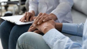 Mental Health Lawyer in Palmdale | Free Consultations 24/7 therapist holding patient’s hand