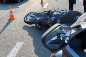 Motorcycle Accident Lawyer in Glendale | Free Consultations 24/7 crashed motorcycle with cones