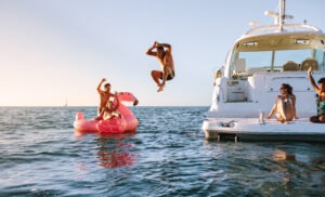 Boating Accident Lawyer in Los Angeles | Free Consultations 24/7 man-diving-off-a-boat