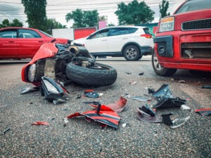 Motorcycle Accident Lawyer in Burbank | Free Consultations 24/7 smashed-up red motorcycle