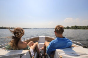 Boating Accident Lawyer in Downey | Free Consultations 24/7 young couple boating on motor boat