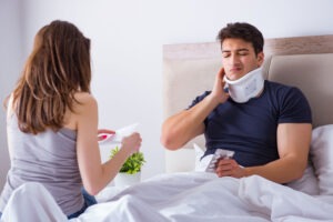 Spinal Cord Injury Lawyer in Downey | Free Consultations 24/7 man in bed with spinal cord injury