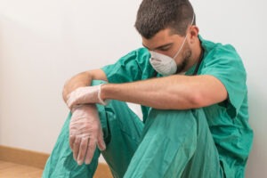 Medical Malpractice Lawyer in Burbank | Free Consultations 24/7 upset surgeon in hallway
