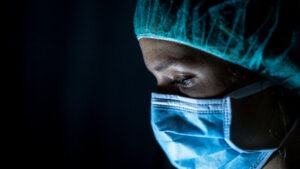 Medical Malpractice Lawyer in Downey | Free Consultations 24/7 young-female-surgeon-wearing-mask