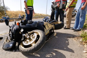 Motorcycle Accident Lawyer in Lakewood | Free Consultations 24/7 The photo depicts a motorcycle accident scene. Contact a Lakewood motorcycle accident lawyer.
